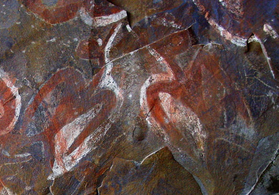 Birdman petroglyphs carved into the rock at Orongo